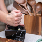 marble mortar with a pestle by oishya