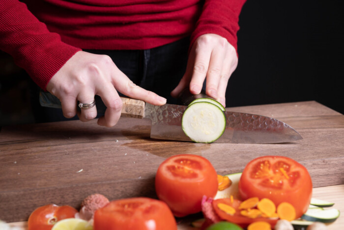 sakai kyuba santoku blue cutting courgettes