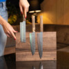 sakai kyuba brown japanese kitchen knife set on wooden magnetic rack