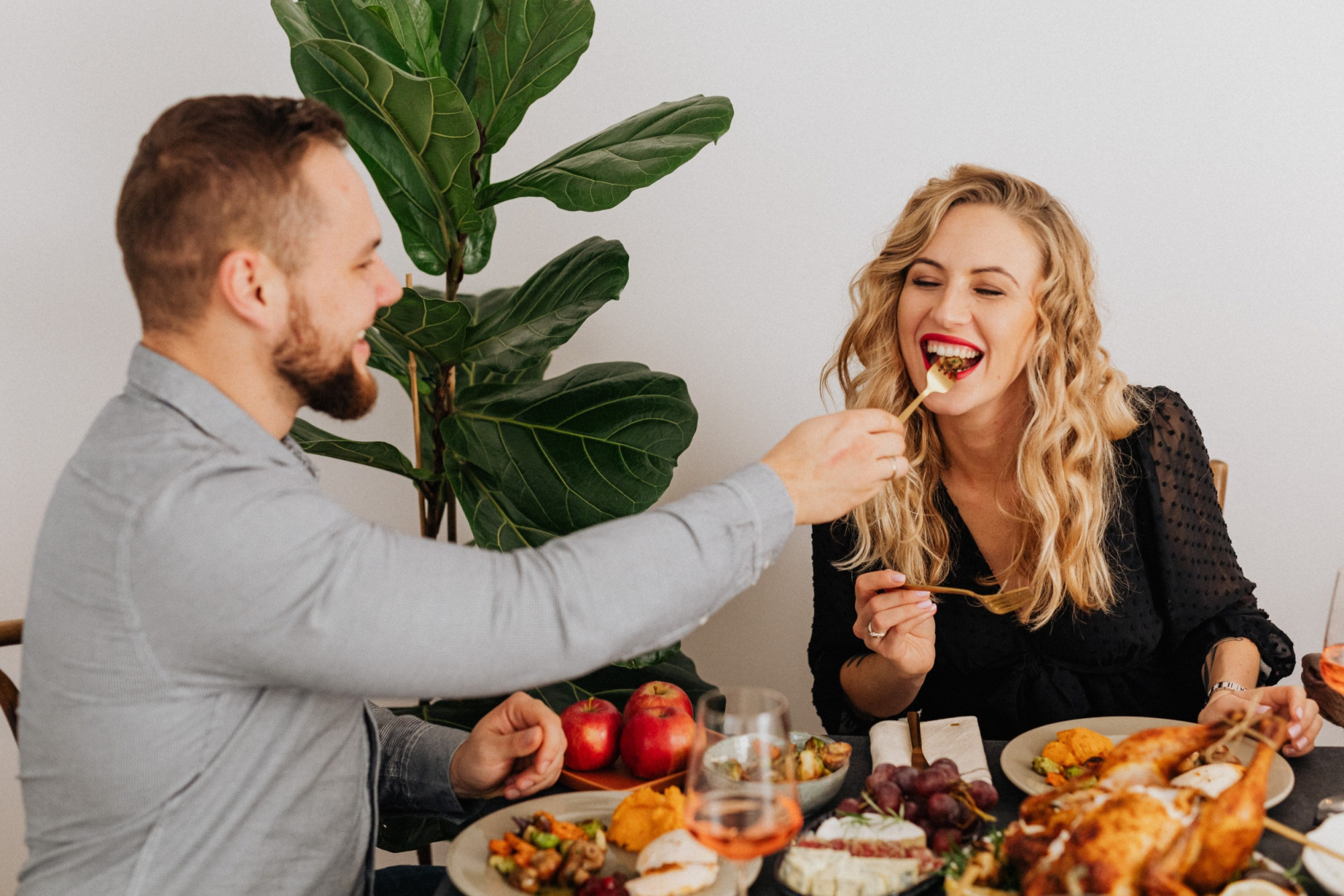 Couple enjoying a home cook meal together
