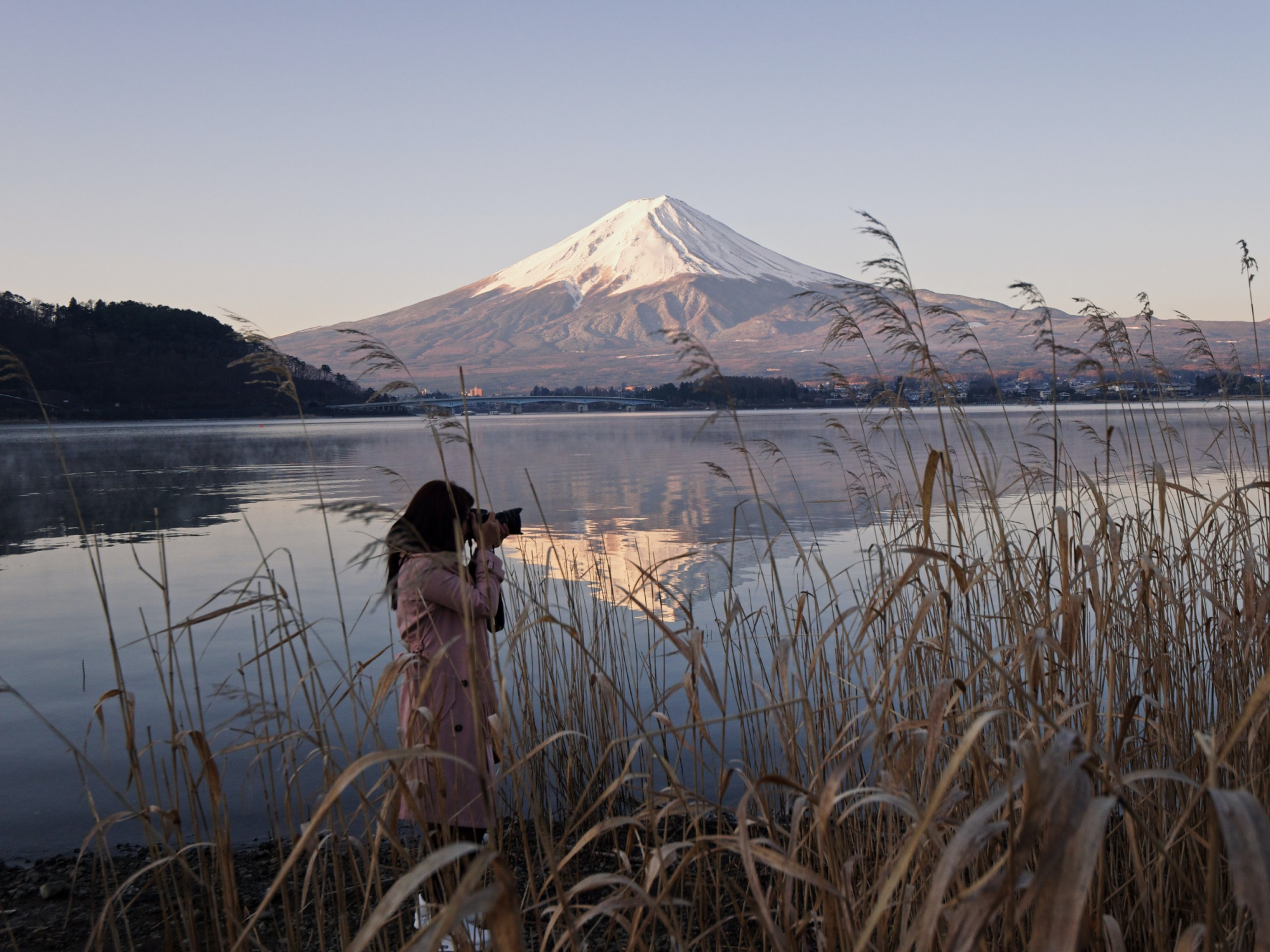 Woman photographing mount fuji