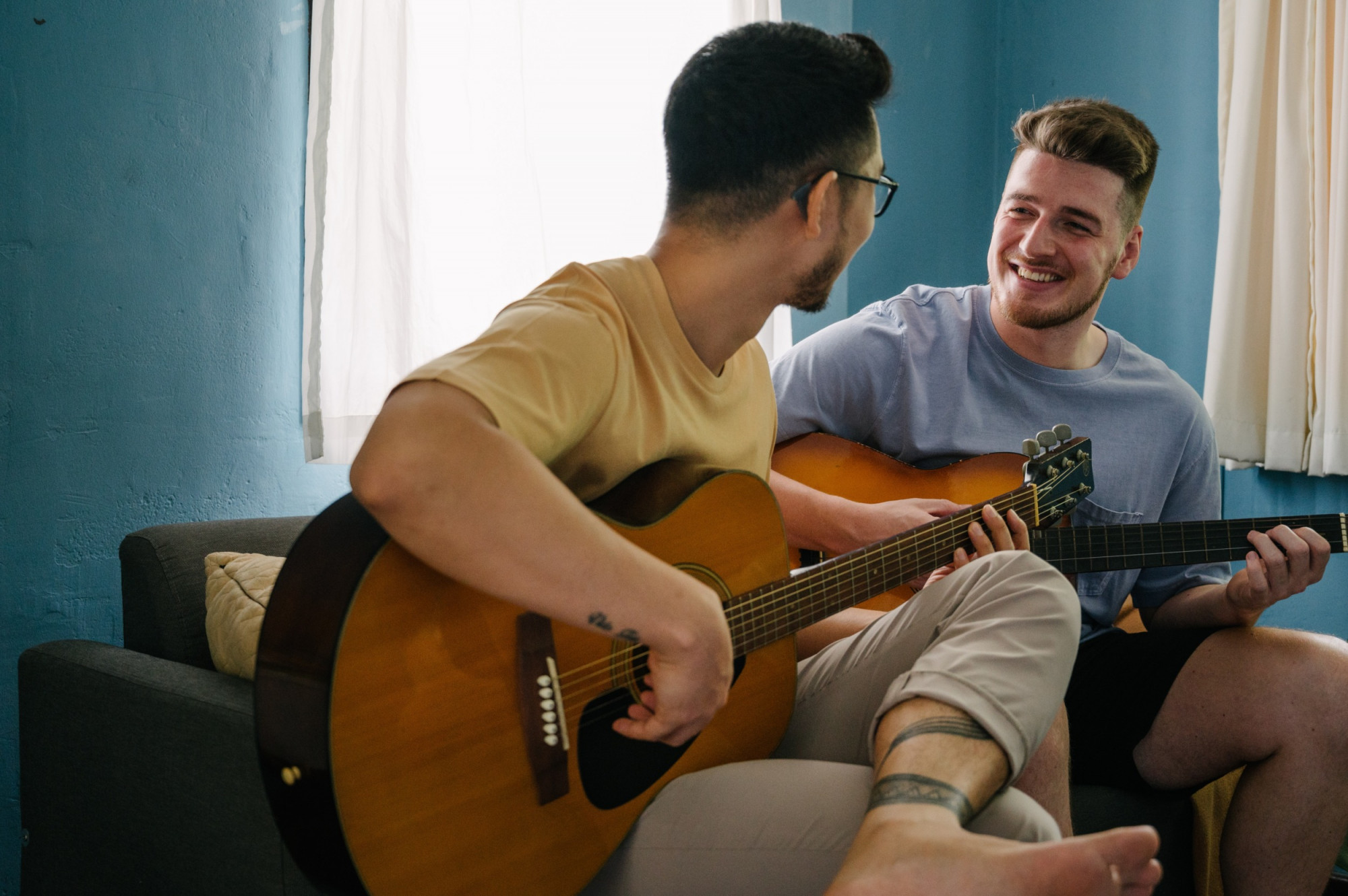 couple playing guitar