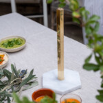 hexagon brass and marble kitchen towel holder by oishya
