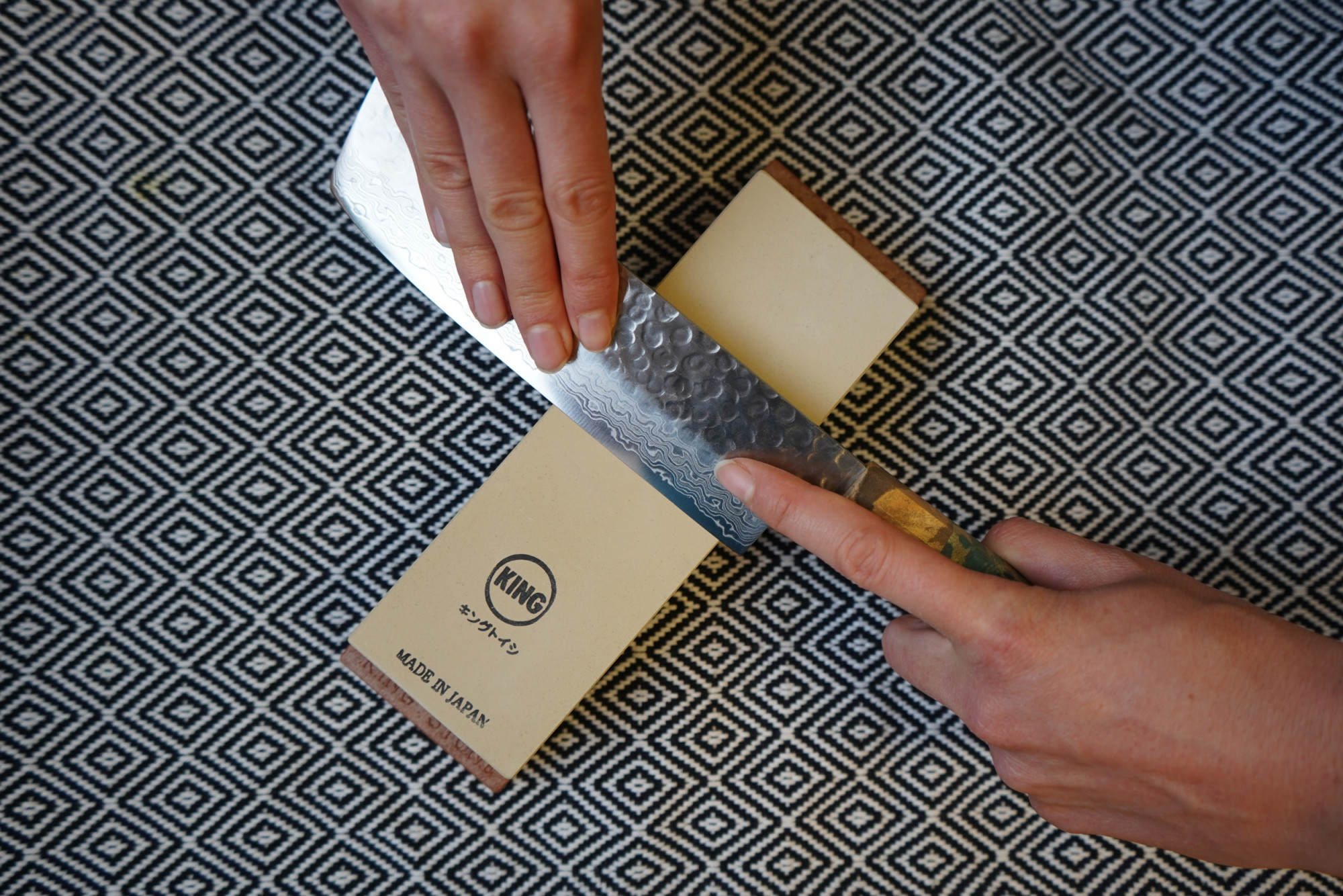 Nakiri knife on sharpening stone