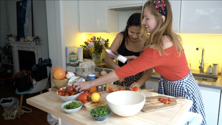 Smiling women using Sakai Kyuba knives