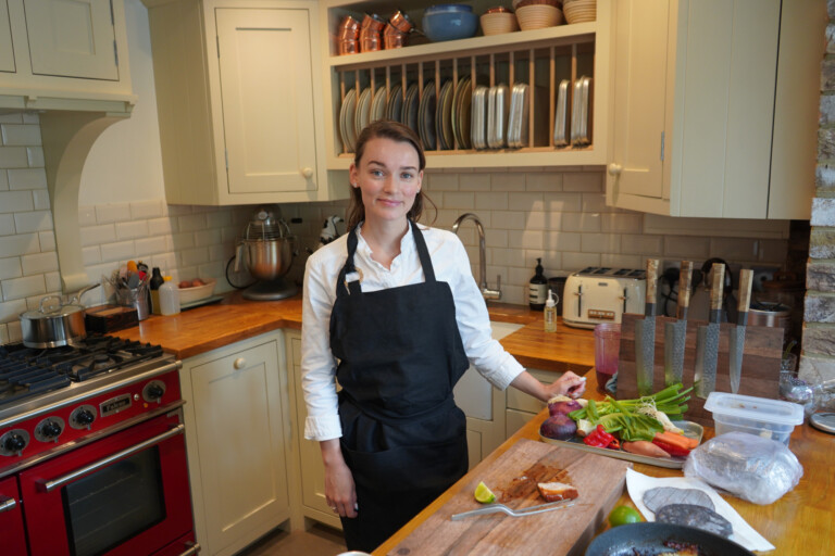 Chef Olivia Burt with Sakai Kyuba knife set in natural brown